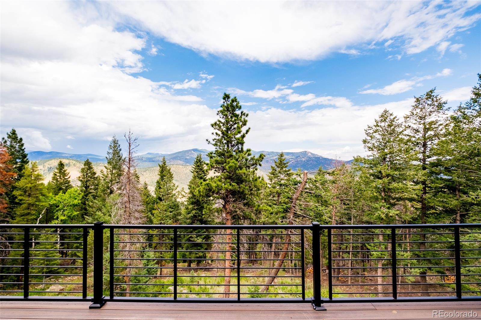 1453 Santa Fe Mountain Road Evergreen, CO 80439 - Photo 41 of 50 a view of a balcony