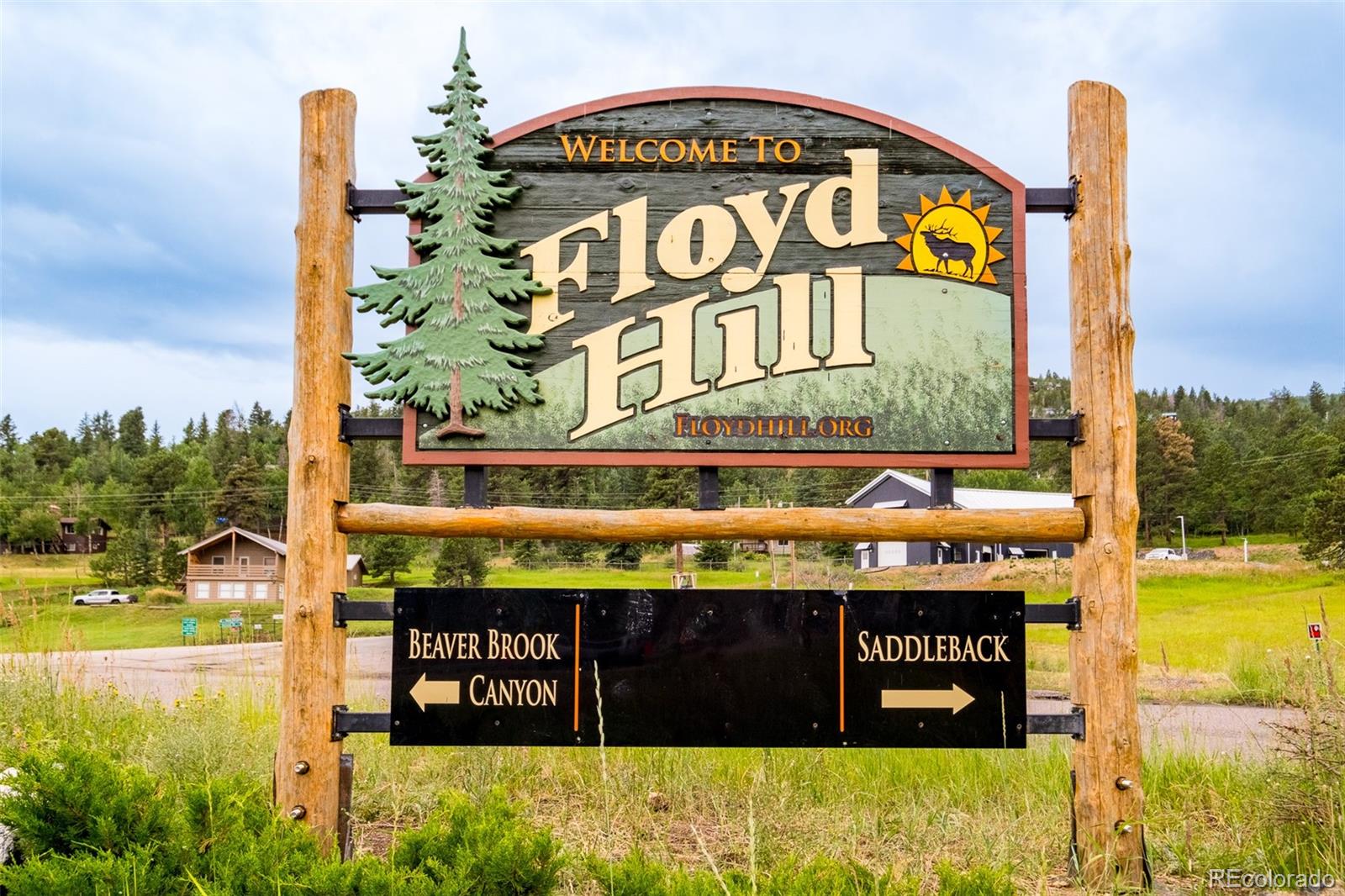 1453 Santa Fe Mountain Road Evergreen, CO 80439 - Photo 48 of 50 a sign on the side of a building