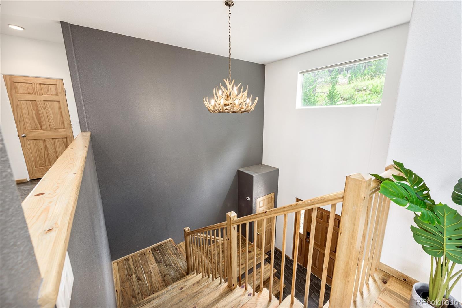 1453 Santa Fe Mountain Road Evergreen, CO 80439 - Photo 7 of 50 a view of balcony with furniture