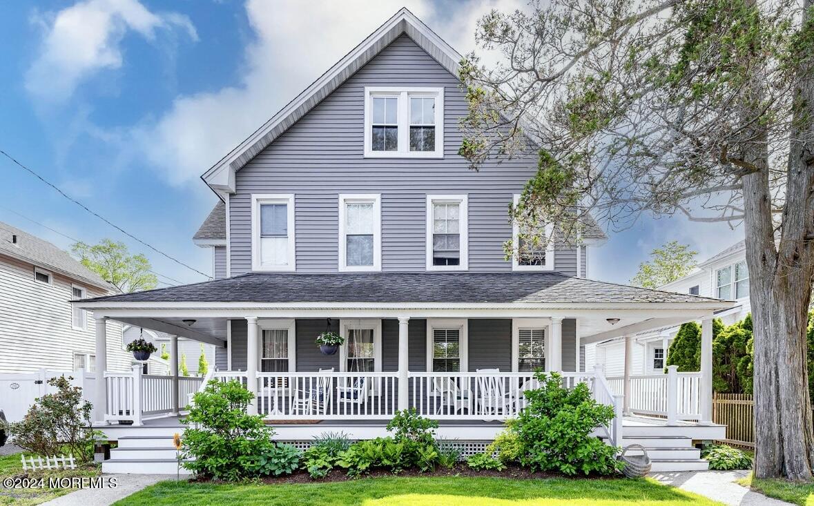 73 Church Street Manasquan, NJ 08736 - Photo 1 of 27 a front view of a house with garden
