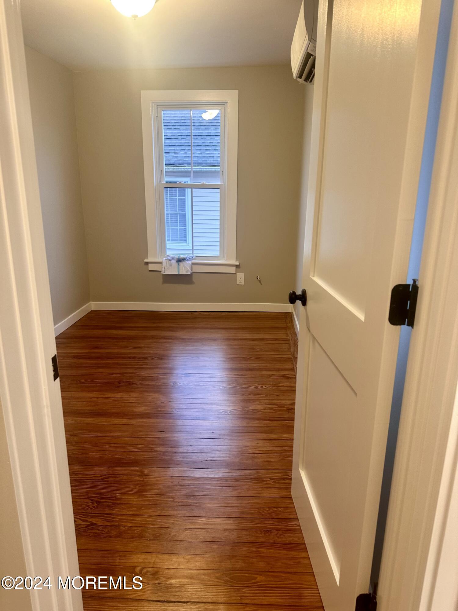 73 Church Street Manasquan, NJ 08736 - Photo 20 of 27 a view of front door with wooden floor