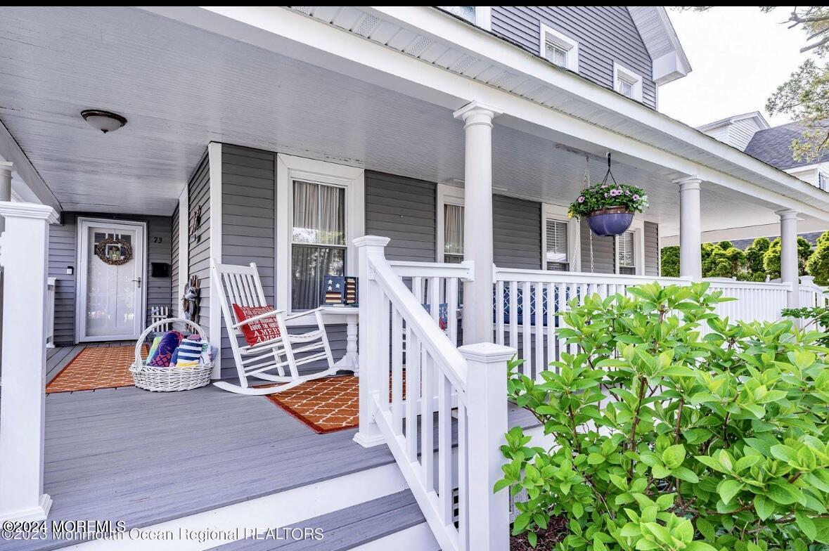 73 Church Street Manasquan, NJ 08736 - Photo 2 of 27 a view of a house with large park and potted plants