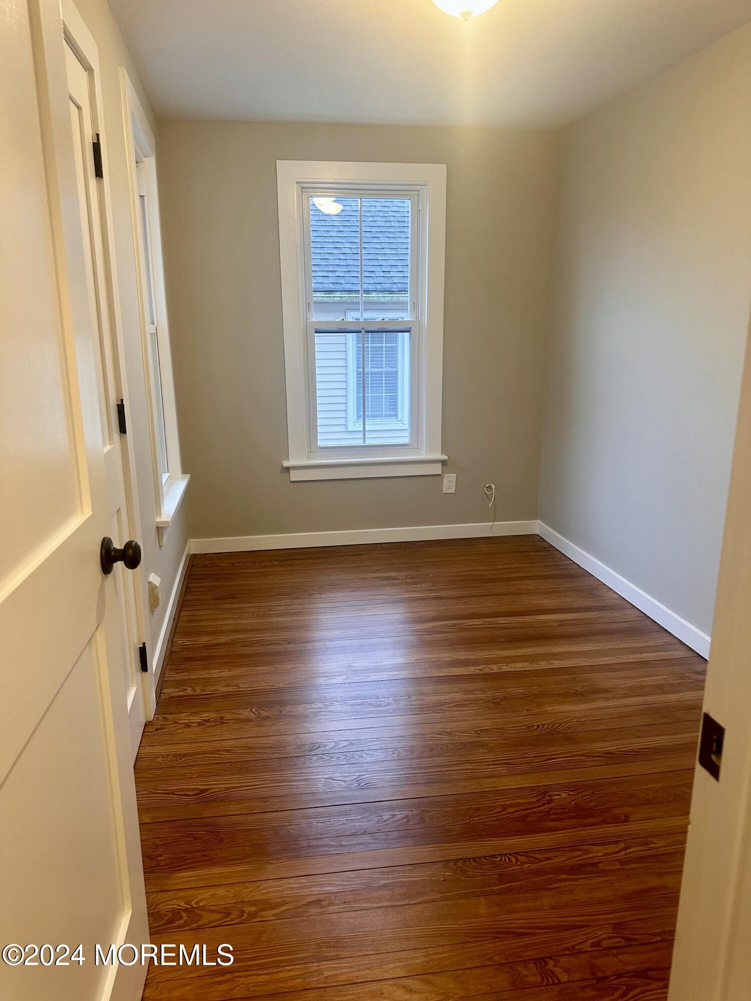 73 Church Street Manasquan, NJ 08736 - Photo 22 of 27 a view of an entryway with wooden floor