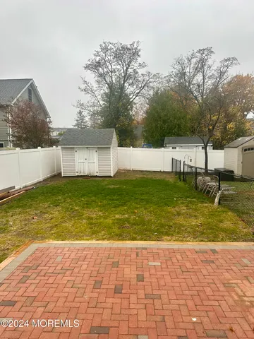 a view of a swimming pool with an outdoor space