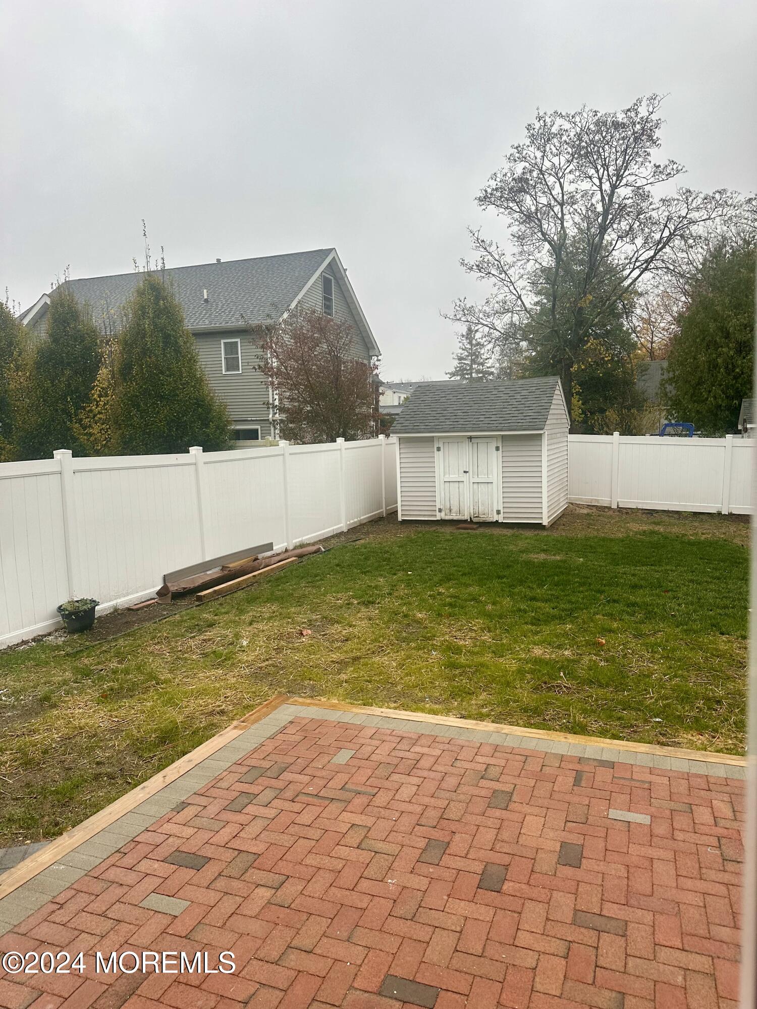 73 Church Street Manasquan, NJ 08736 - Photo 26 of 27 a view of a swimming pool with an outdoor space