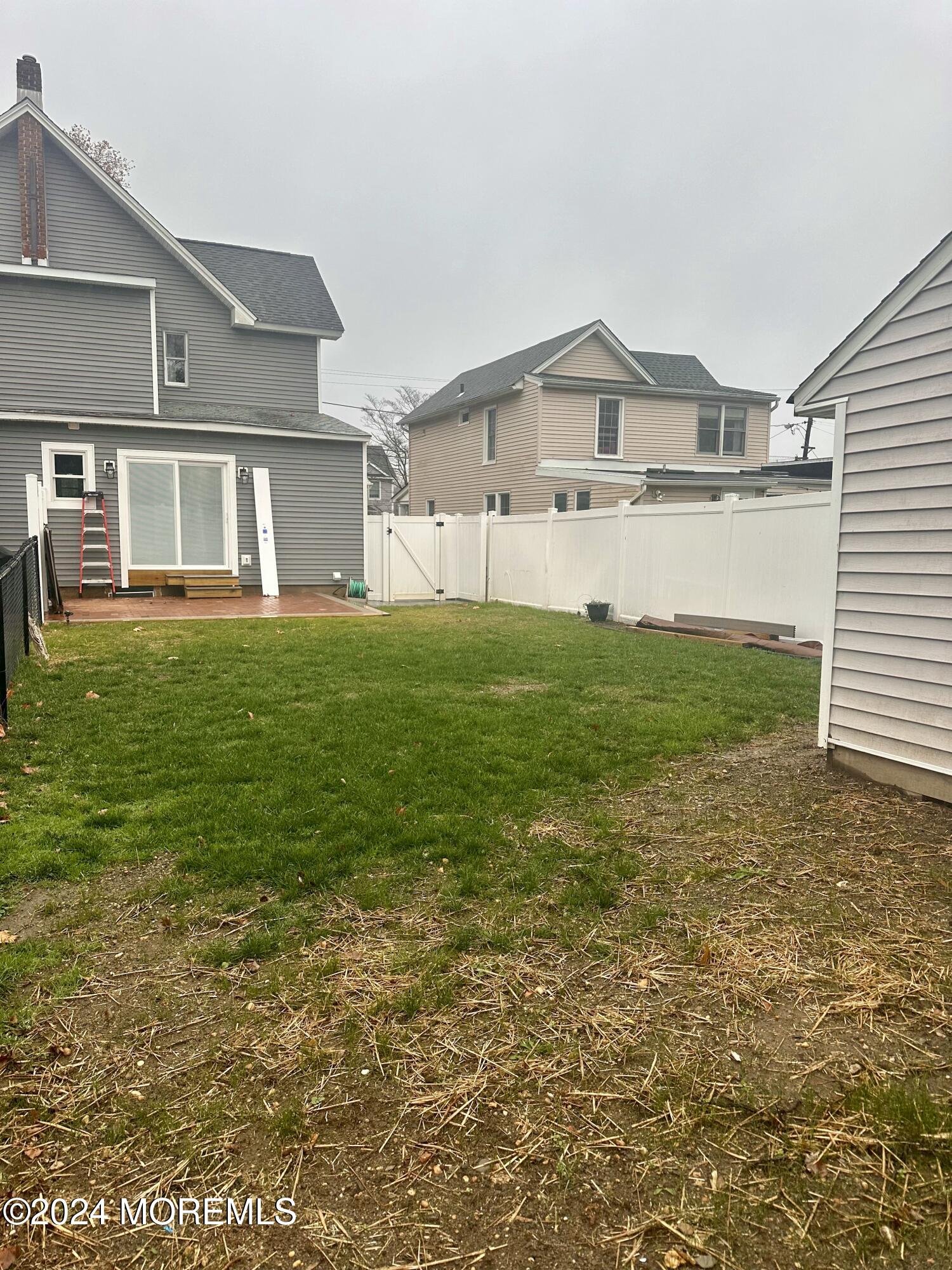 73 Church Street Manasquan, NJ 08736 - Photo 27 of 27 a front view of a house with a yard