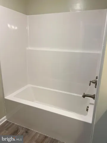 a bathroom with bathtub