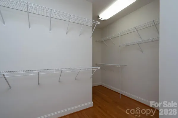 a view of a room with racks on the wall