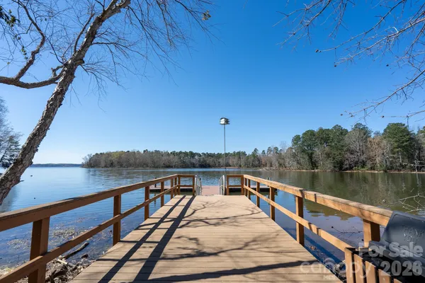 a view of wooden floor with a lake