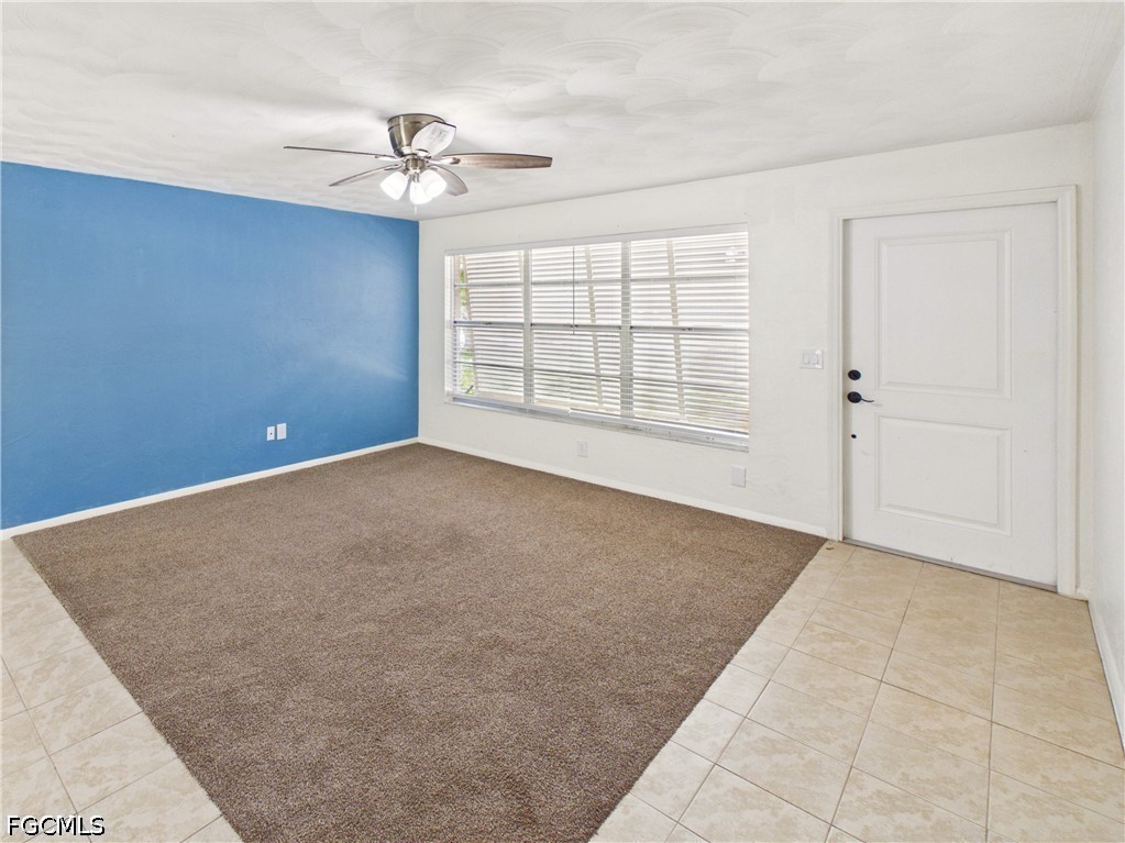 18541 Iris Road Fort Myers, FL 33967 - Photo 2 of 18 a view of an empty room with a window