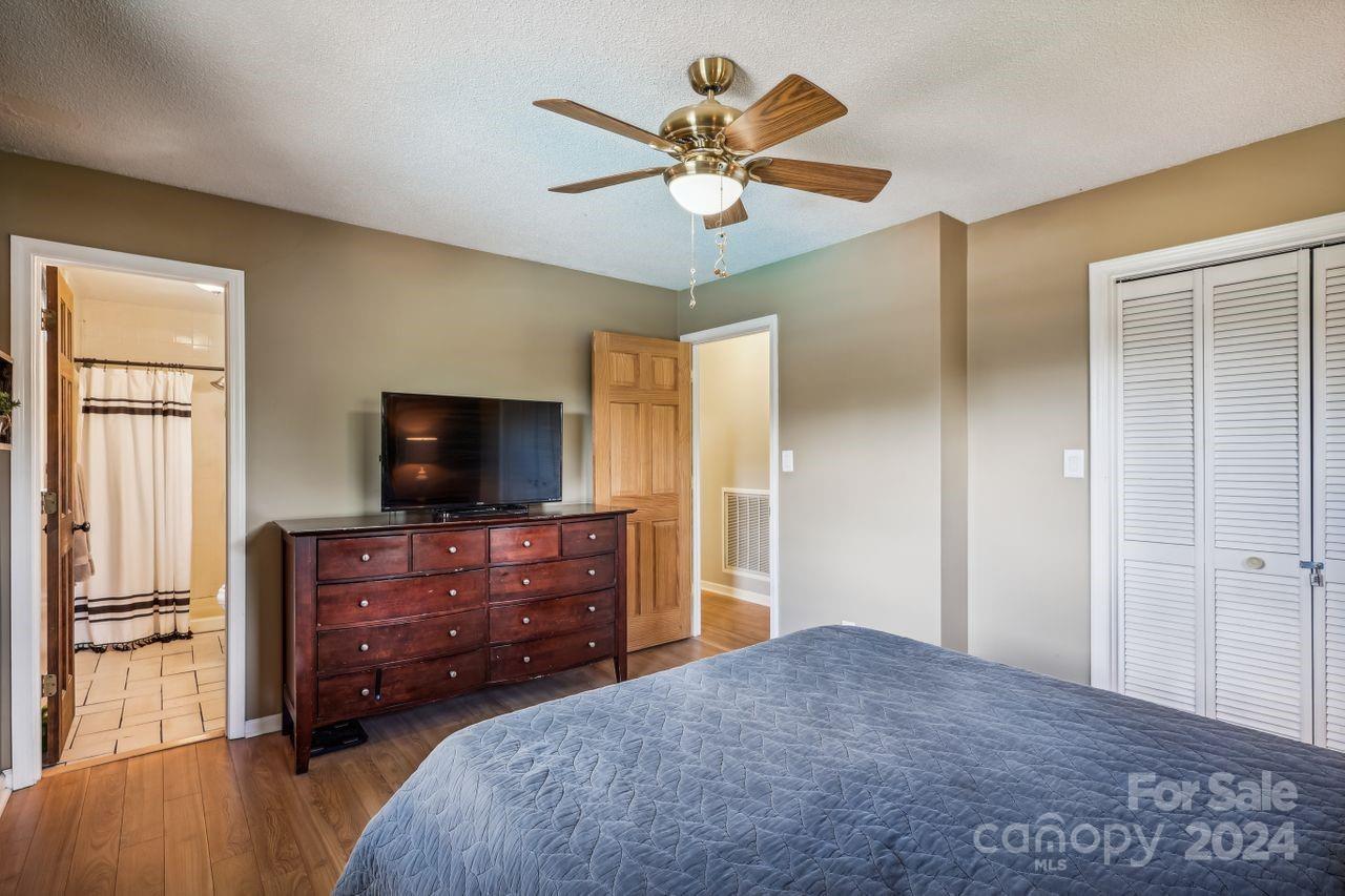 2362 Agony Acres Road Clover, SC 29710 - Photo 16 of 36 a bedroom with a bed and a flat screen tv