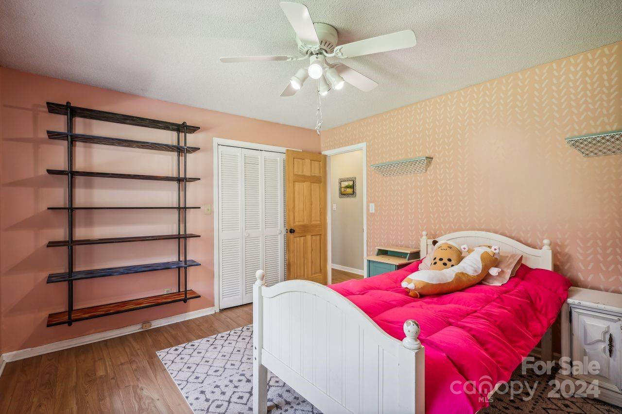 2362 Agony Acres Road Clover, SC 29710 - Photo 19 of 36 a bedroom with a bed and a window