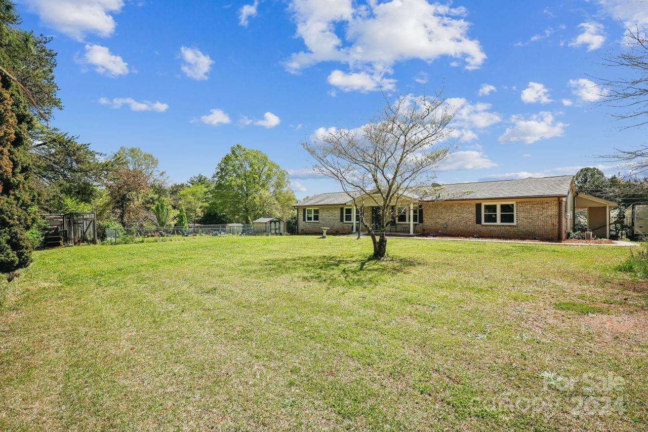 2362 Agony Acres Road Clover, SC 29710 - Photo 31 of 36 a front view of a house with a yard