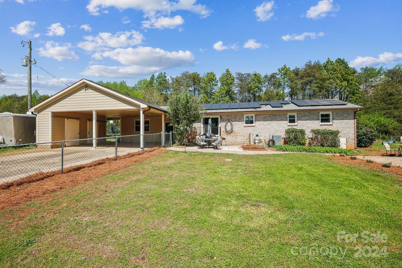 2362 Agony Acres Road Clover, SC 29710 - Photo 32 of 36 a front view of a house with garden