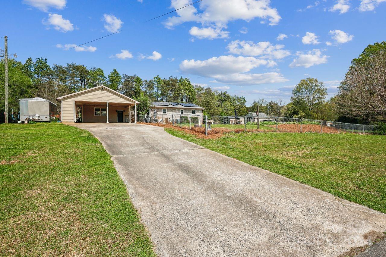 2362 Agony Acres Road Clover, SC 29710 - Photo 33 of 36 a front view of a house with a yard
