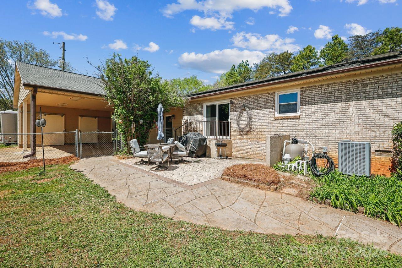 2362 Agony Acres Road Clover, SC 29710 - Photo 34 of 36 a view of a house with backyard and sitting area
