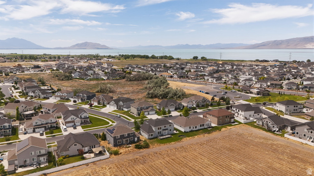 111 East Silver Oak Road Vineyard, UT 84059 - Photo 45 of 50 Expansive aerial perspective showcasing a residential development with a lake and mountains in the background