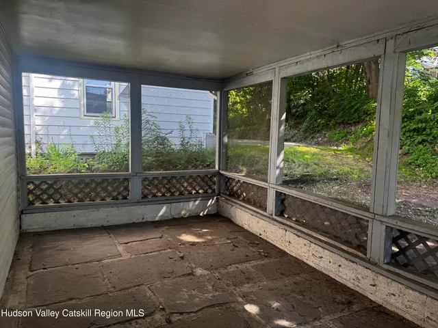 a view of a large room with a large window