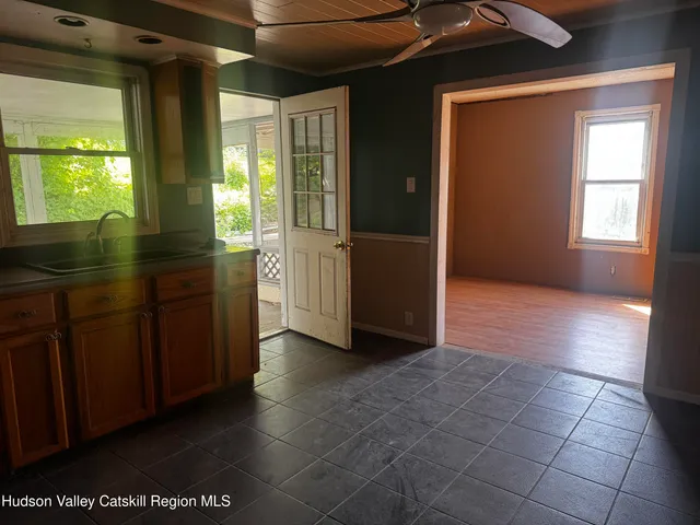 a view of hallway with windows