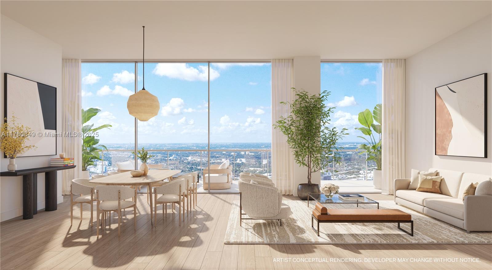 a very nice looking living room with a large window and dining table