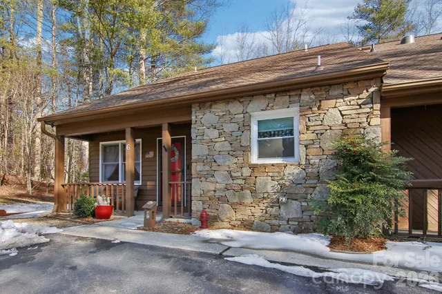 a front view of a house with a outdoor space