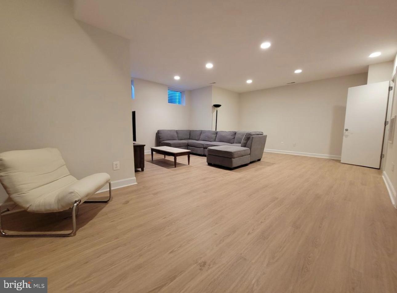 1418 44th Street Northwest, Unit B Washington, DC 20007 - Photo 19 of 20 a view of living room with furniture and a wooden floor