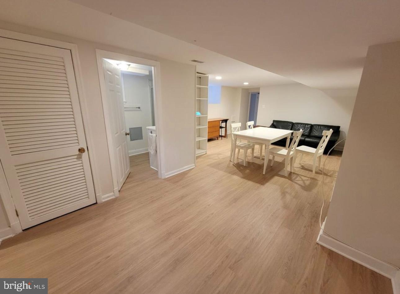 1418 44th Street Northwest, Unit B Washington, DC 20007 - Photo 8 of 20 a view of a dining area with furniture and wooden floor