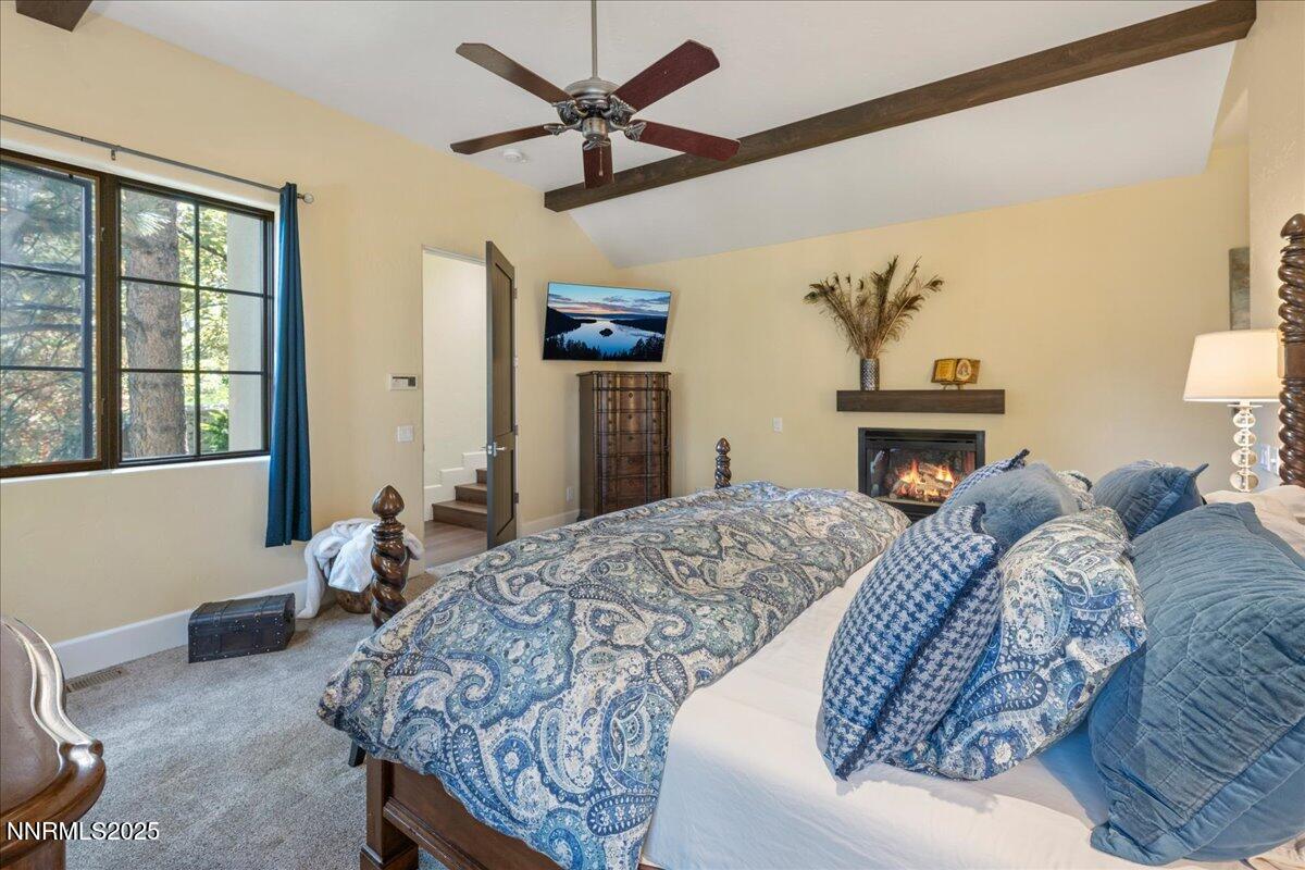 5945 Chambery Circle Reno, NV 89511 - Photo 20 of 62 a living room with a bed furniture and a window