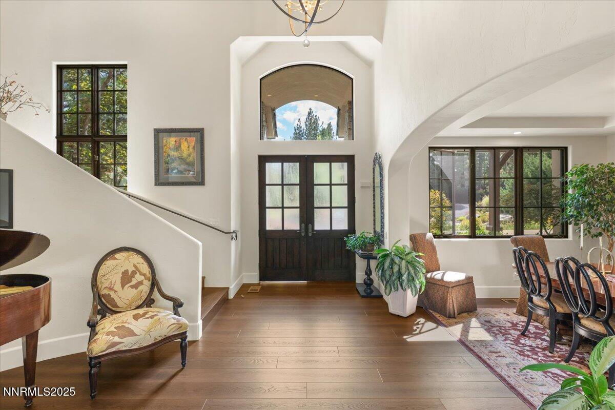 5945 Chambery Circle Reno, NV 89511 - Photo 7 of 62 a view of a livingroom with furniture window wooden floor and windows