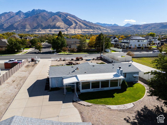 12958 South 300 East Draper, UT 84020 - Photo 16 of 38 Aerial perspective of suburban area featuring a mountainous background