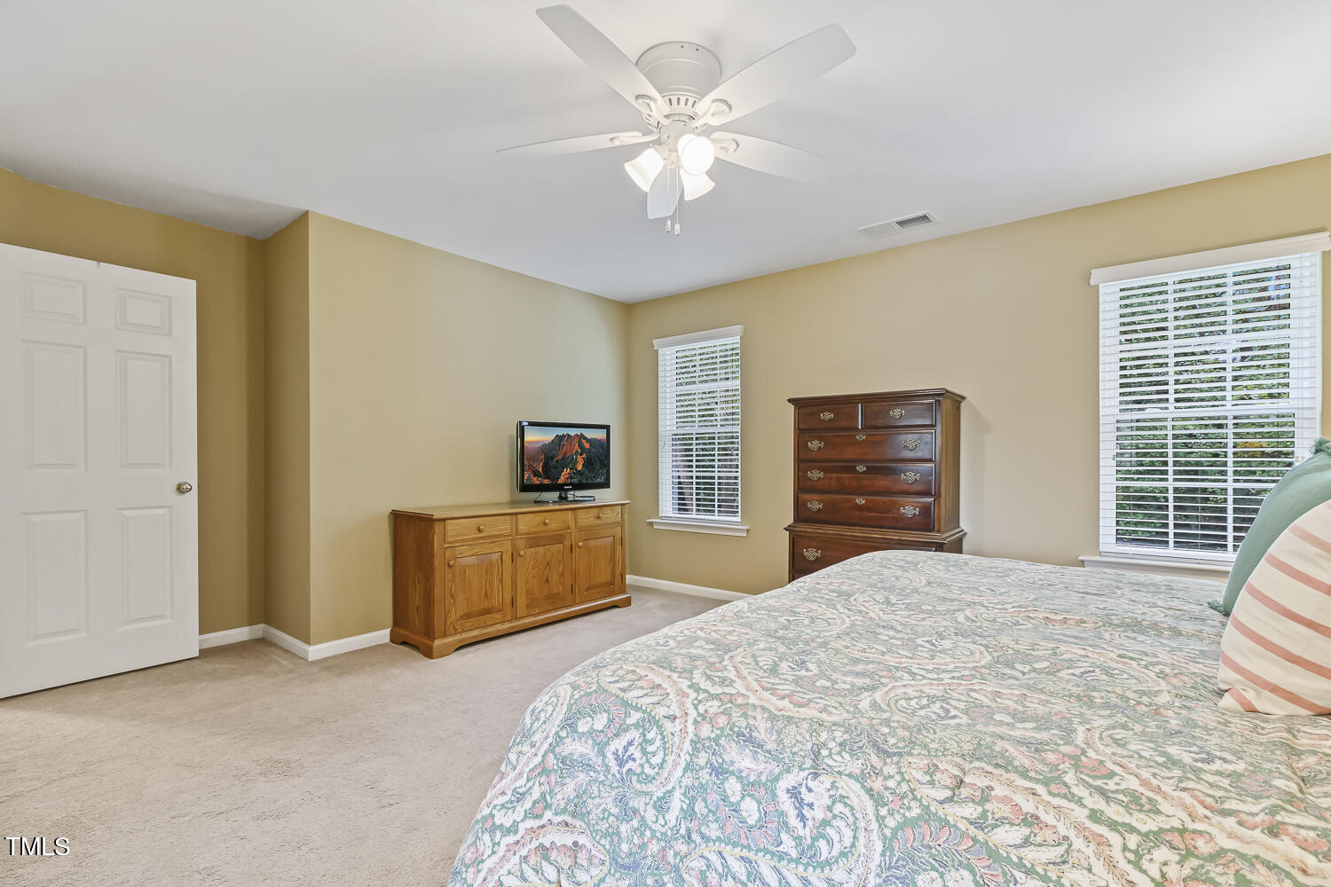 1001 Lake Moraine Place Raleigh, NC 27607 - Photo 26 of 37 a bedroom with a bed and a couch