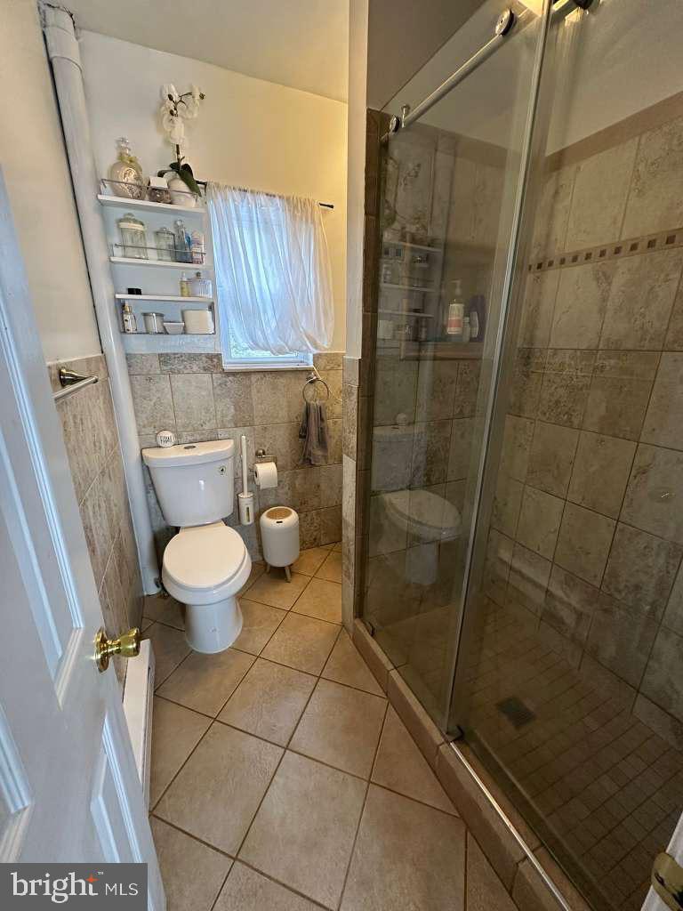 1536 Rothley Avenue Abington, PA 19090 - Photo 12 of 21 a bathroom with a sink and a shower