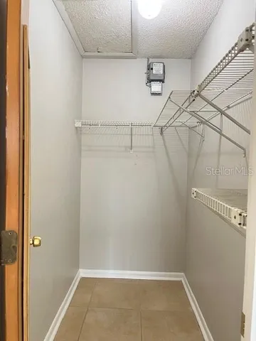 a view of a room with racks on the wall