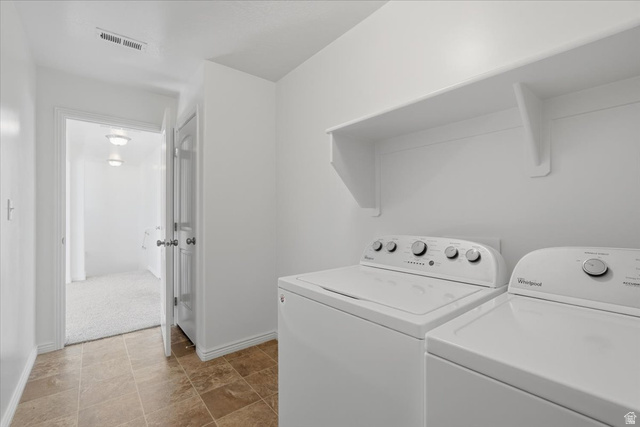 1218 Moonlight Drive Elk Ridge, UT 84651 - Photo 21 of 44 Laundry area with baseboards and independent washer and dryer
