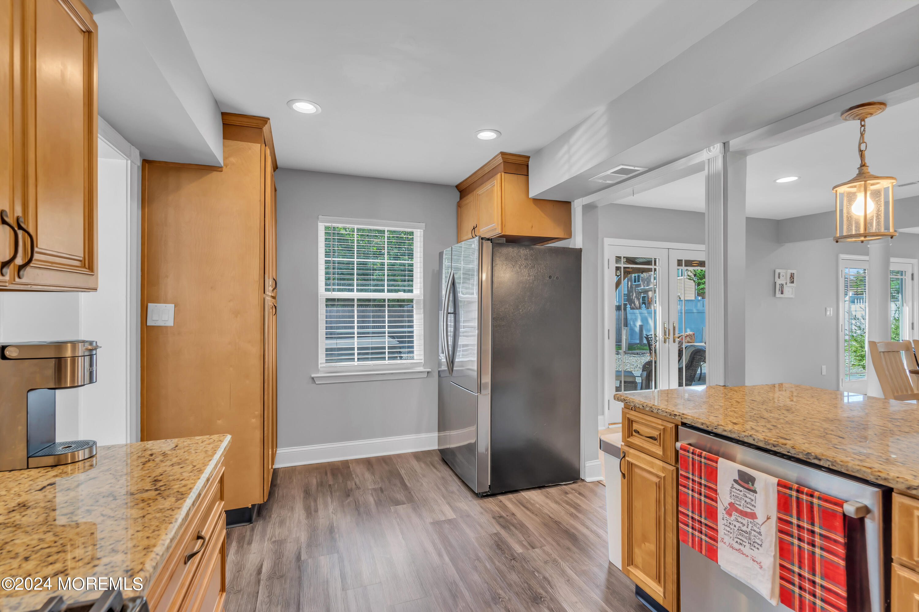538 Adamston Road Brick, NJ 08723 - Photo 17 of 55 a kitchen with stainless steel appliances granite countertop a refrigerator a stove and a wooden floors