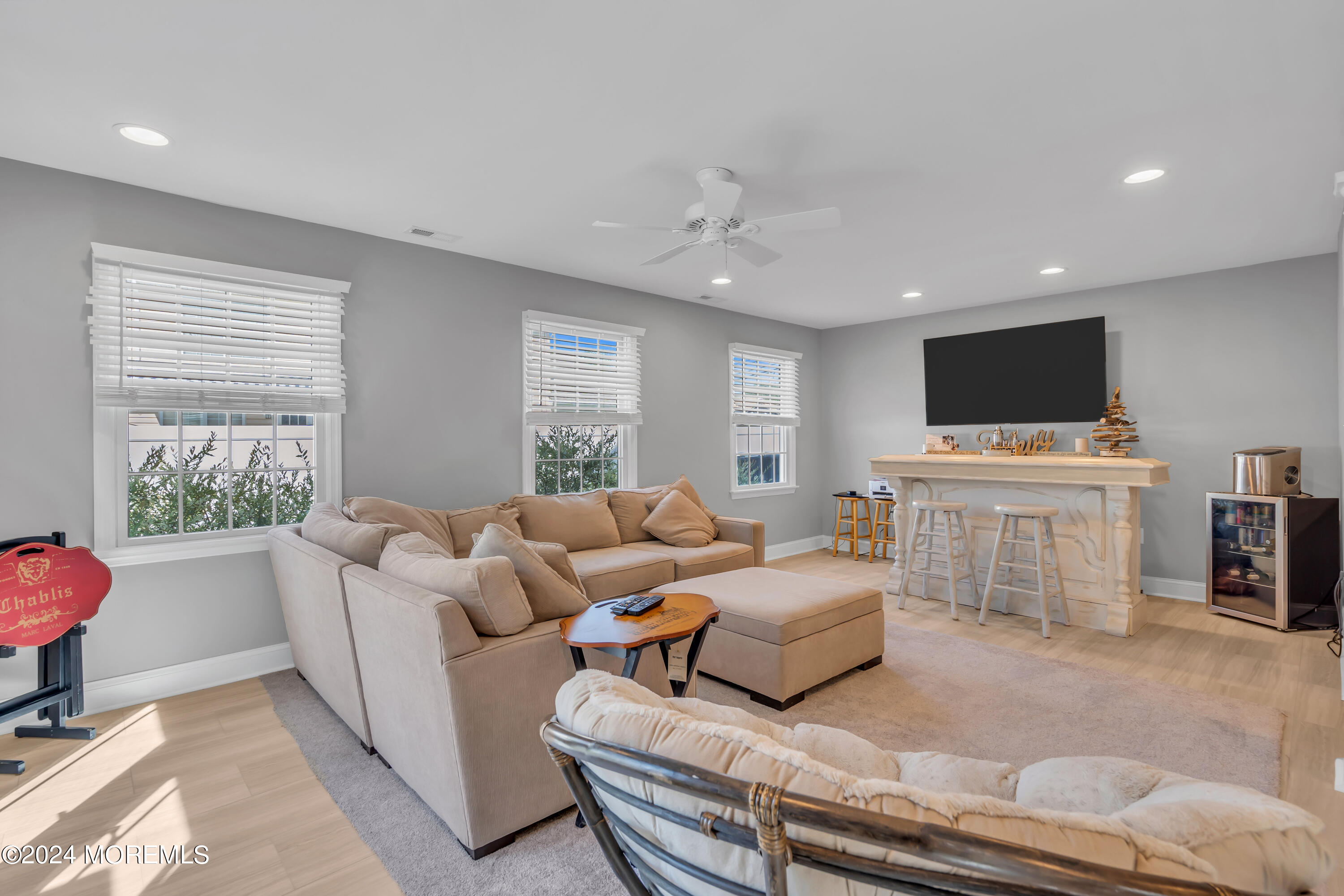 538 Adamston Road Brick, NJ 08723 - Photo 25 of 55 a living room with furniture and a flat screen tv