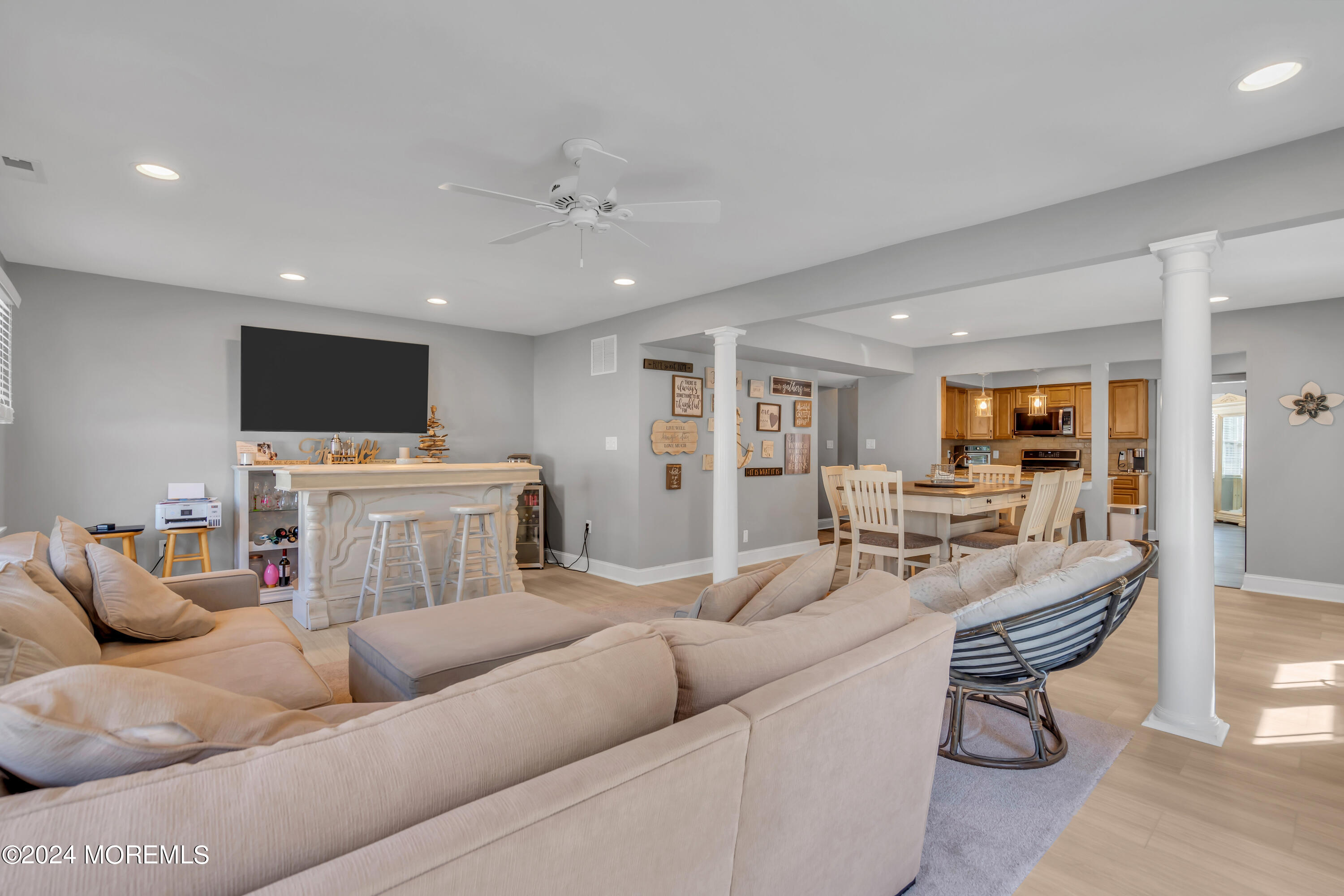 538 Adamston Road Brick, NJ 08723 - Photo 26 of 55 a living room with furniture and a flat screen tv