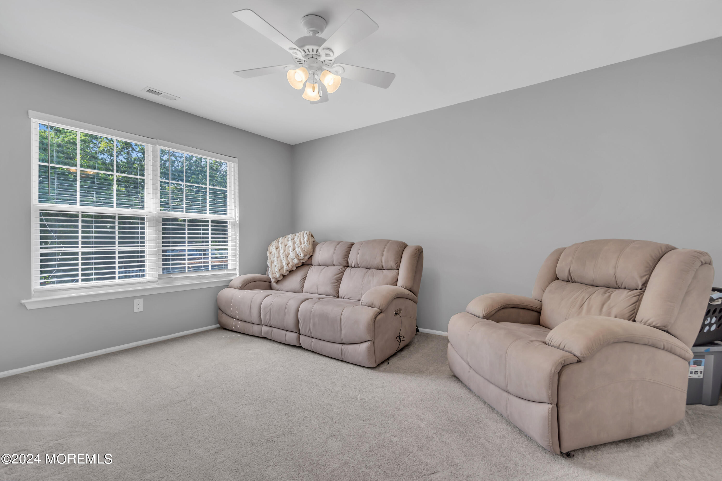 538 Adamston Road Brick, NJ 08723 - Photo 33 of 55 a living room with furniture and a large window