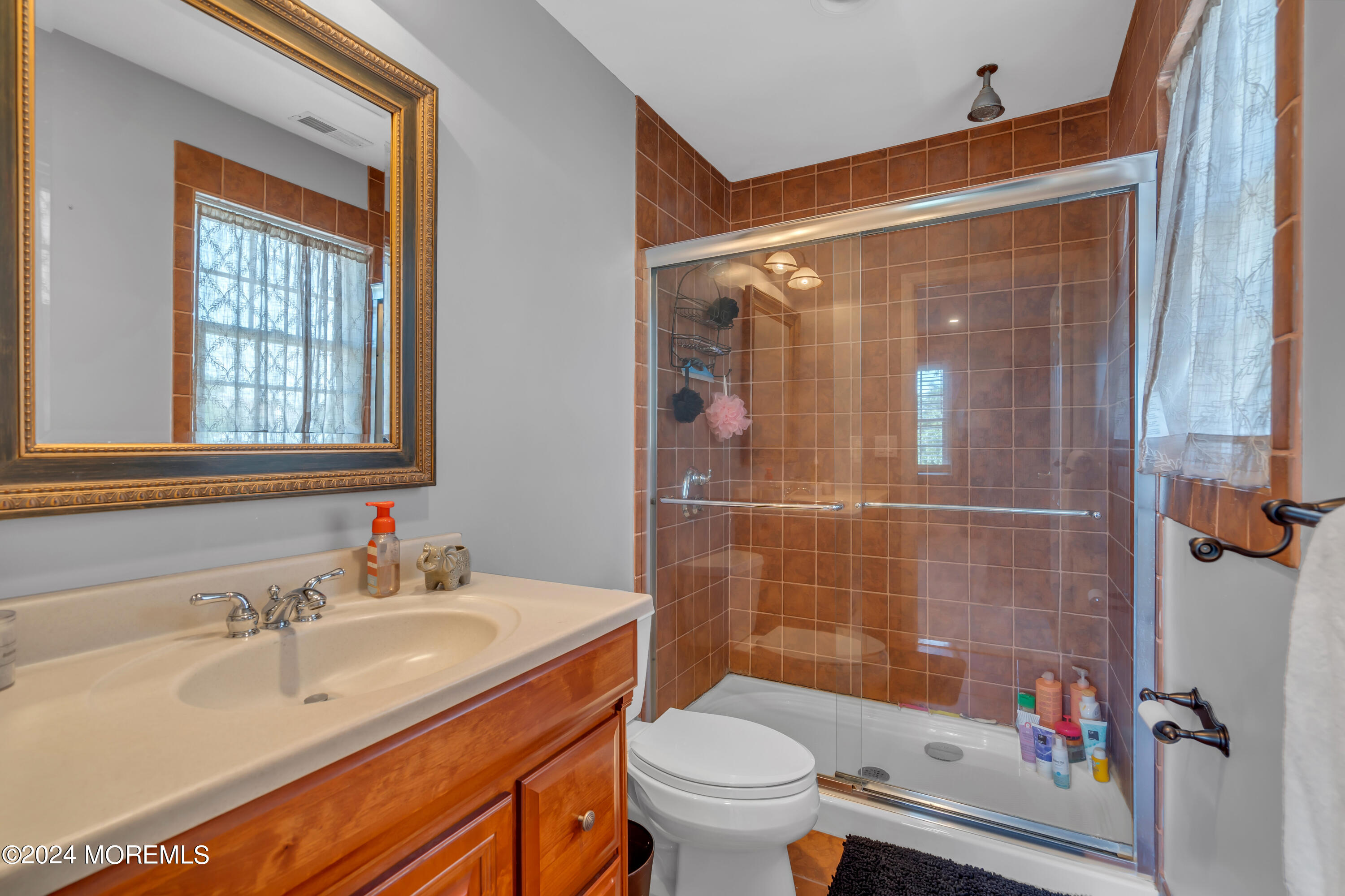 538 Adamston Road Brick, NJ 08723 - Photo 37 of 55 a bathroom with a sink toilet and shower