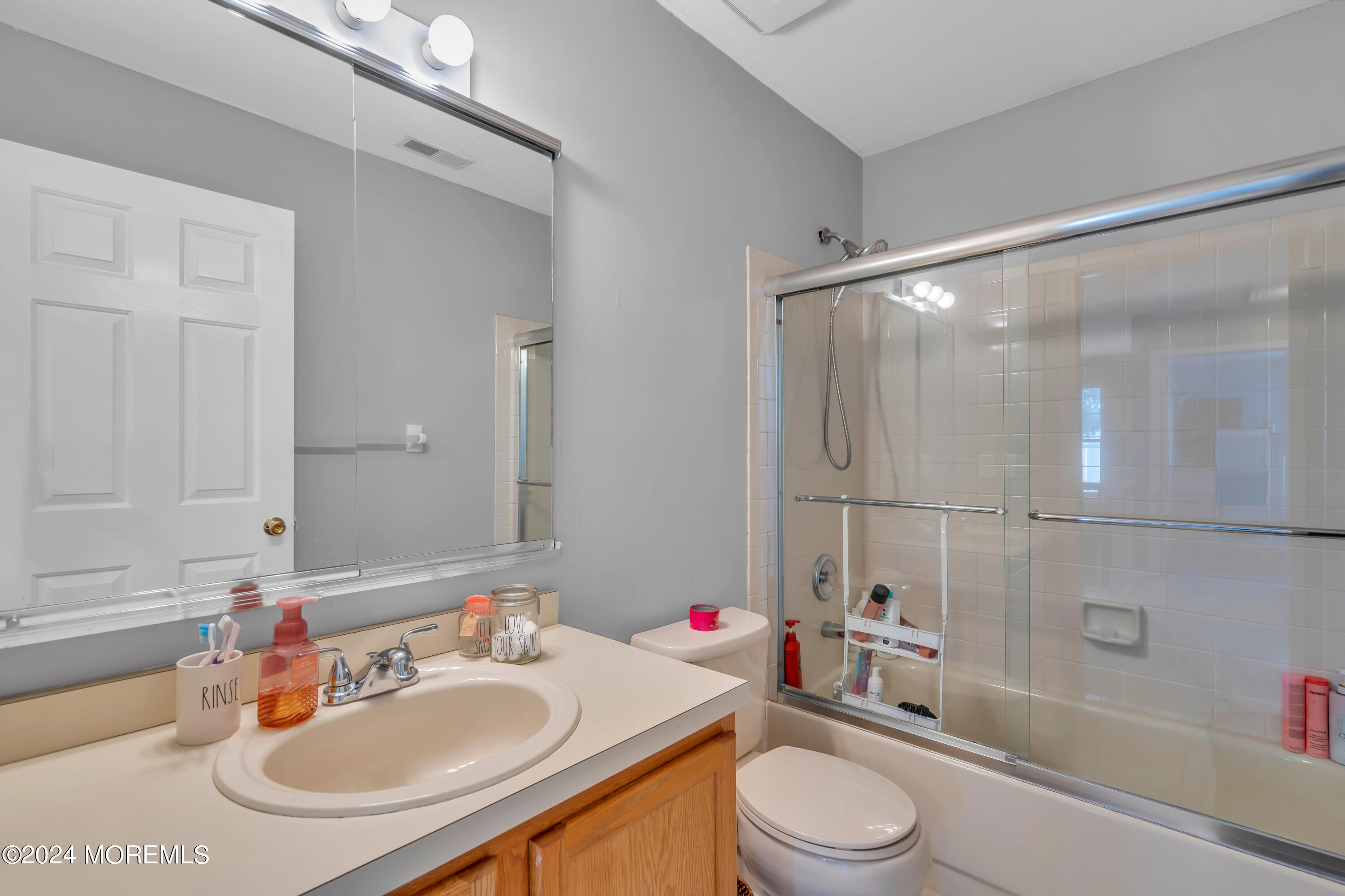 538 Adamston Road Brick, NJ 08723 - Photo 40 of 55 a bathroom with a sink toilet vanity and shower