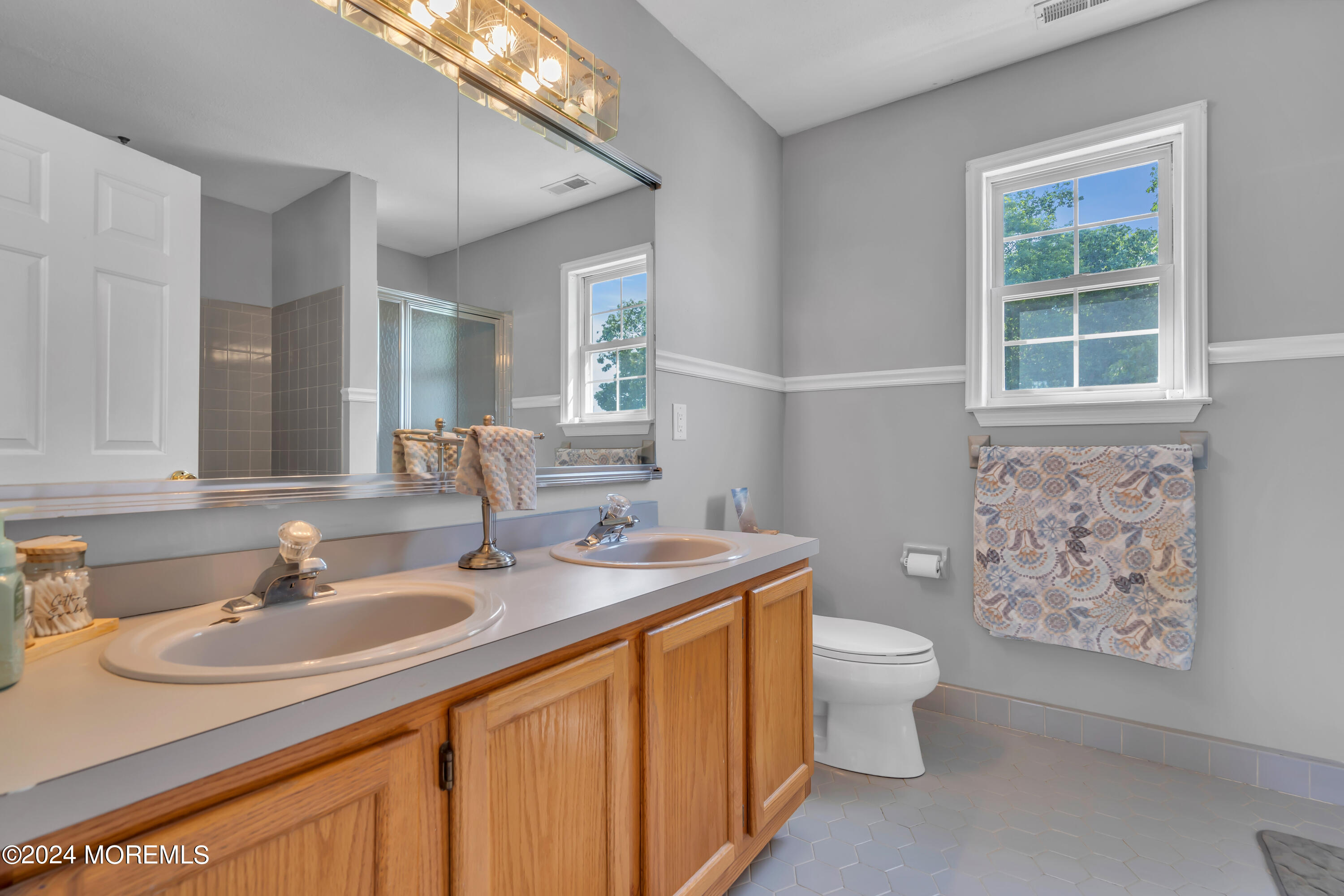 538 Adamston Road Brick, NJ 08723 - Photo 43 of 55 a bathroom with a sink toilet and a mirror
