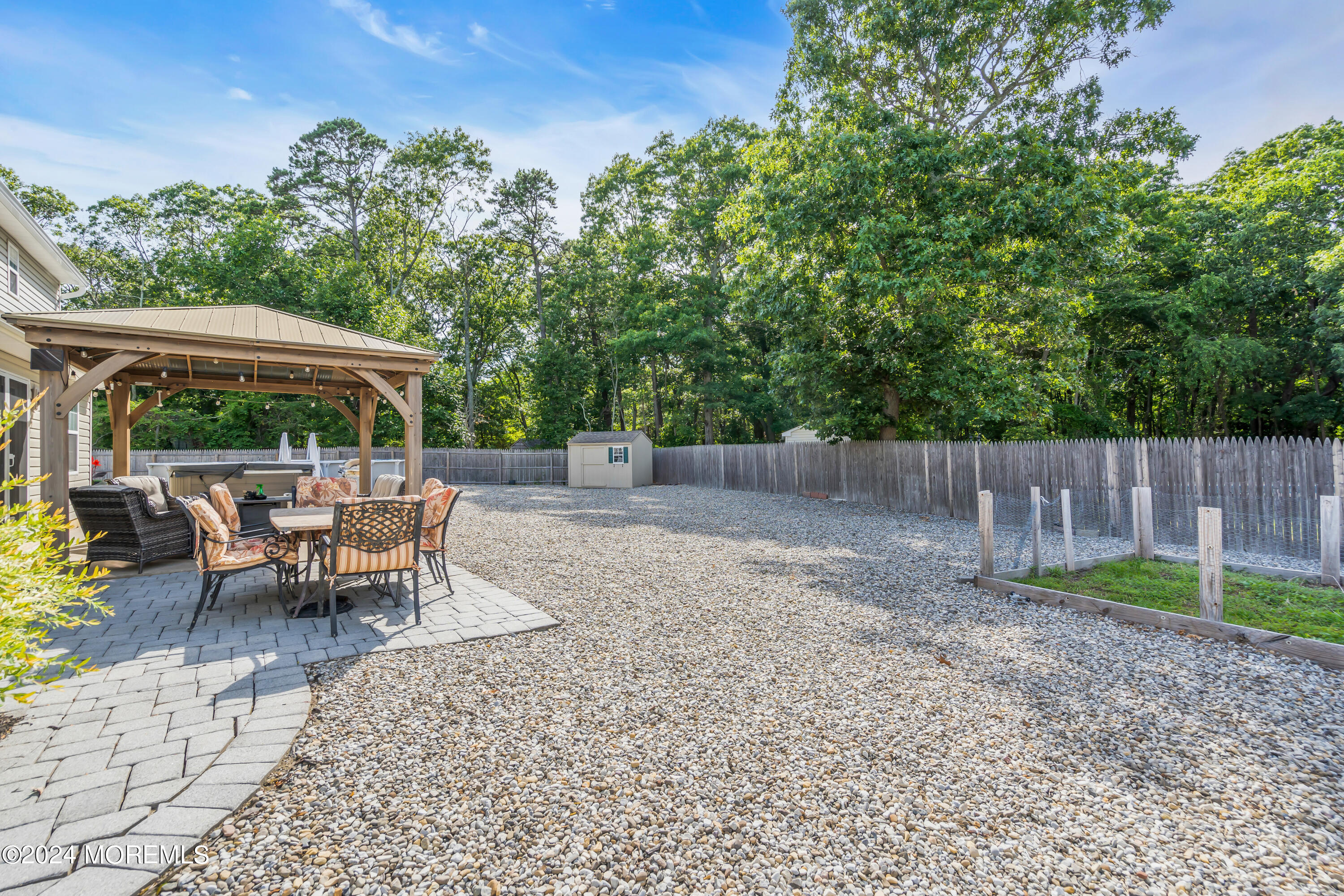 538 Adamston Road Brick, NJ 08723 - Photo 45 of 55 a view of backyard with green space and trampoline