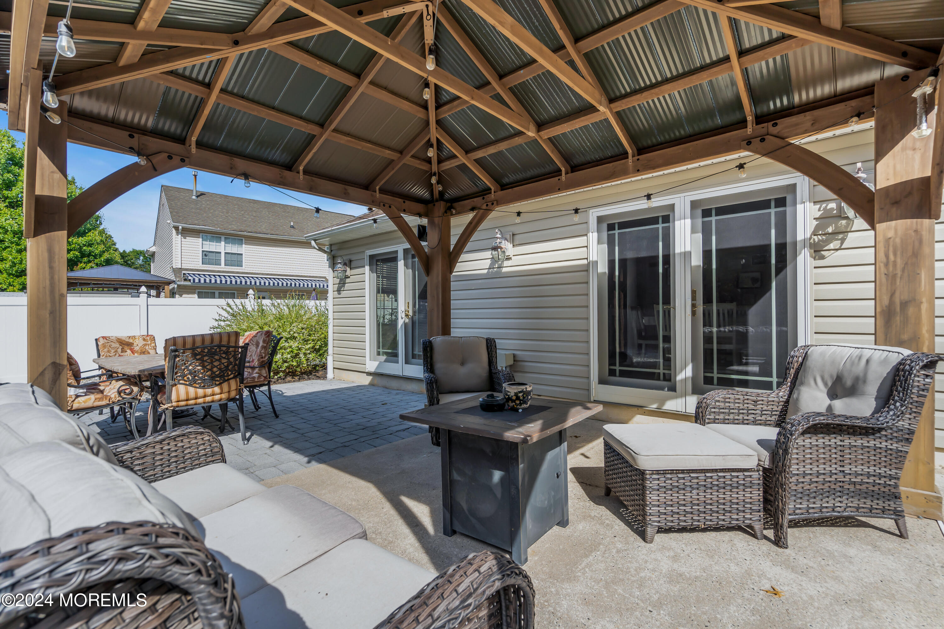 538 Adamston Road Brick, NJ 08723 - Photo 47 of 55 a view of a patio with a table and chairs