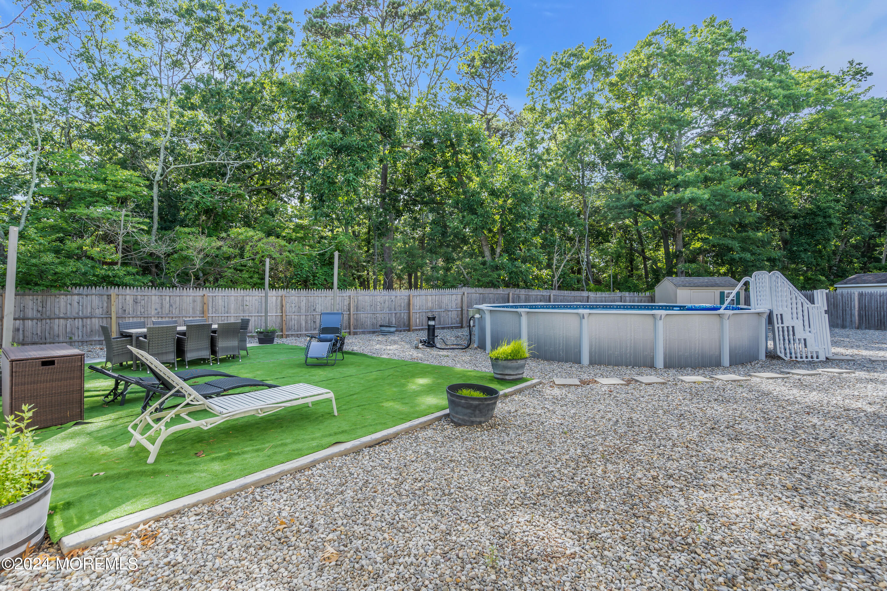538 Adamston Road Brick, NJ 08723 - Photo 52 of 55 a backyard of a house with a table and chairs