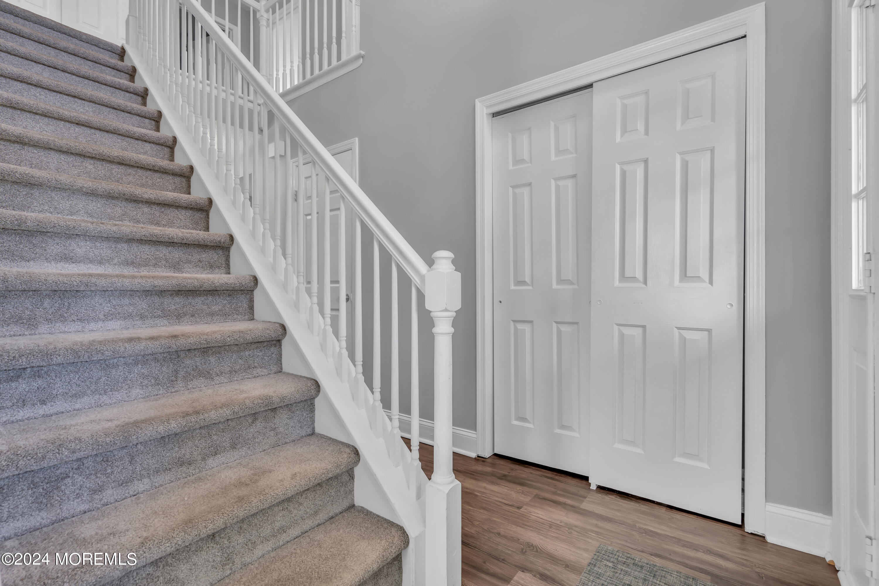 538 Adamston Road Brick, NJ 08723 - Photo 6 of 55 a view of staircase with wooden floor and white walls
