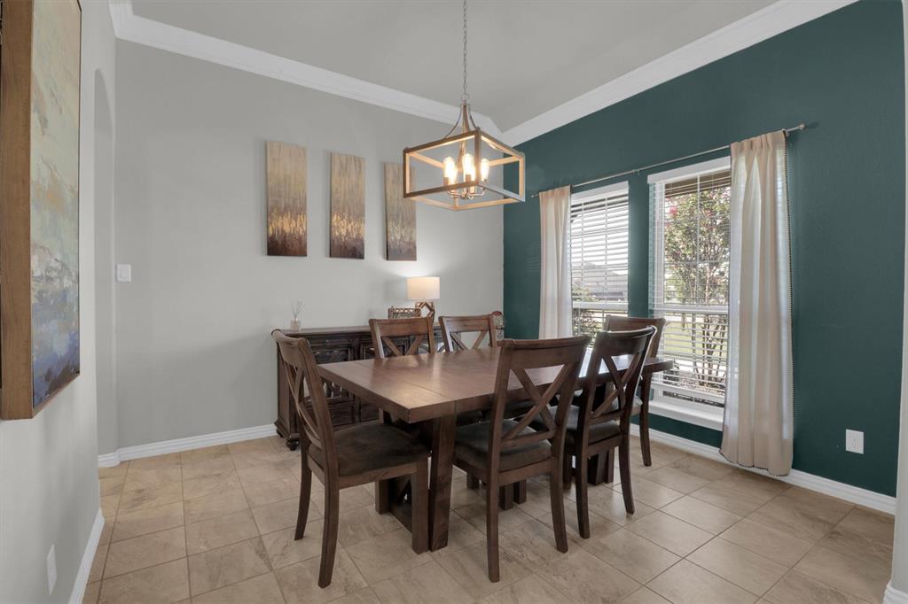 7818 Sagebrush Lane Godley, TX 76044 - Photo 13 of 38 a view of a dining room with furniture window and outside view