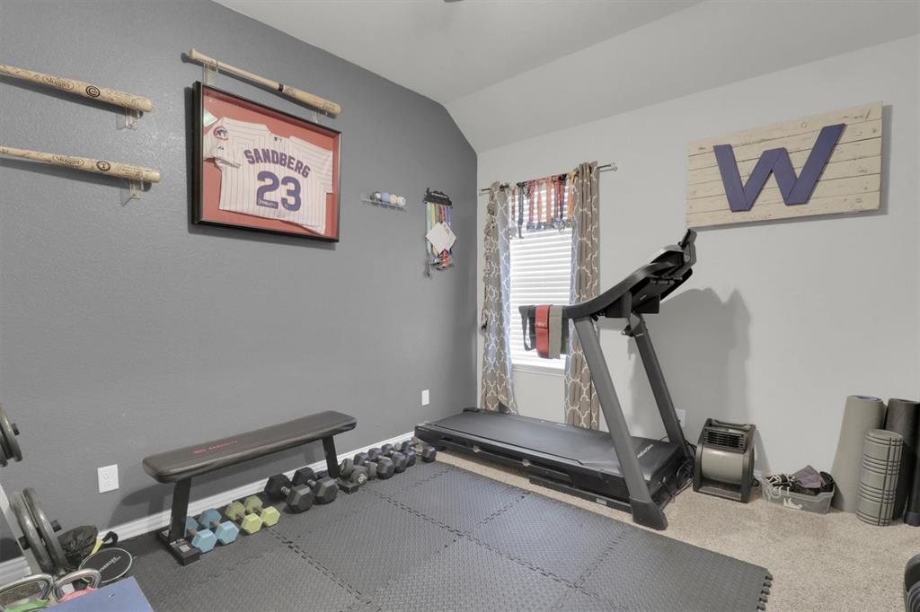 7818 Sagebrush Lane Godley, TX 76044 - Photo 27 of 38 a view of a room with gym equipment