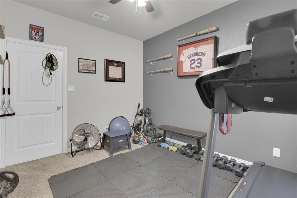 7818 Sagebrush Lane Godley, TX 76044 - Photo 28 of 38 a bathroom with a sink and a mirror