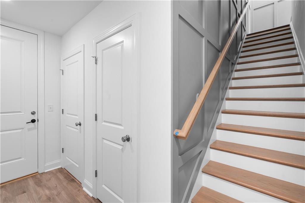 538 Alice Way, Unit D3 Cumming, GA 30040 - Photo 3 of 52 a view of entryway with wooden floor and stairs