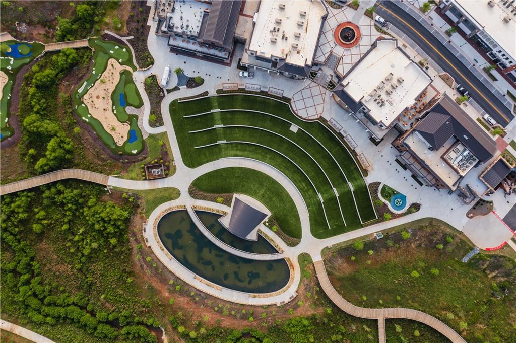 538 Alice Way, Unit D3 Cumming, GA 30040 - Photo 36 of 52 an aerial view of a house with garden space and swimming pool